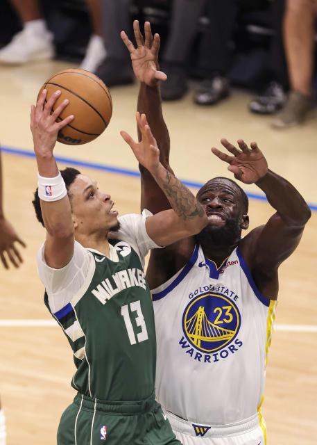 (251031) -- MILWAUKEE, Oct. 31, 2025 (Xinhua) -- Milwaukee Bucks' Ryan Rollins (L) vies against Golden State Warriors' Draymond Green during the 2025-2026 NBA regular season game between Milwaukee Bucks and Golden State Warriors in Milwaukee, the United States, on Oct. 30, 2025. (Photo by Joel Lerner/Xinhua)