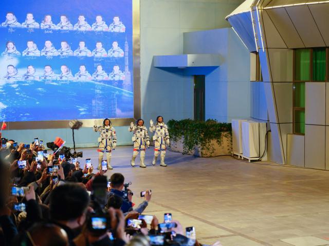 (251031) -- JIUQUAN, Oct. 31, 2025 (Xinhua) -- This photo taken on Oct. 31, 2025 shows a scene at the send-off ceremony for the three Chinese astronauts of the Shenzhou-21 crewed space mission at the Jiuquan Satellite Launch Center in northwest China. A send-off ceremony for the three Chinese astronauts of the Shenzhou-21 crewed space mission was held Friday at the Jiuquan Satellite Launch Center in northwest China, according to the China Manned Space Agency. (Xinhua/Ma Jinrui)