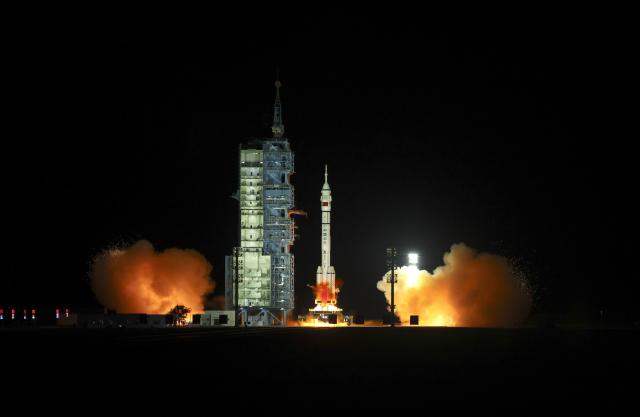 (251031) -- JIUQUAN, Oct. 31, 2025 (Xinhua) -- The Shenzhou-21 crewed spaceship, atop a Long March-2F carrier rocket, blasts off from the Jiuquan Satellite Launch Center in northwest China, Oct. 31, 2025. China launched the Shenzhou-21 crewed spaceship on Friday, sending three astronauts to its orbiting space station on a six-month mission. (Photo by Wang Jiangbo/Xinhua)