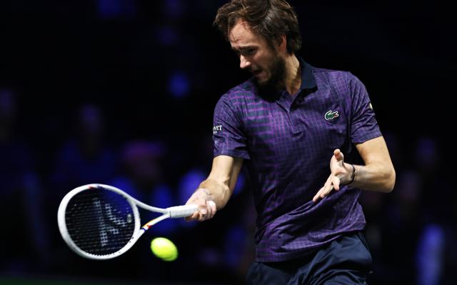 (251101) -- PARIS, Nov. 1, 2025 (Xinhua) -- Daniil Medvedev of Russia hits a return during the quarterfinal match against Alexander Zverev of Germany at the Paris ATP Masters 1000 tennis tournament at Paris La Defense Arena in Paris, France, Oct. 31, 2025. (Xinhua/Gao Jing)