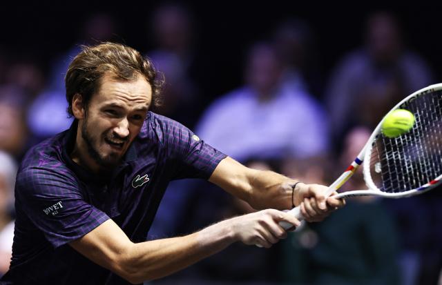 (251101) -- PARIS, Nov. 1, 2025 (Xinhua) -- Daniil Medvedev of Russia hits a return during the quarterfinal match against Alexander Zverev of Germany at the Paris ATP Masters 1000 tennis tournament at Paris La Defense Arena in Paris, France, Oct. 31, 2025. (Xinhua/Gao Jing)