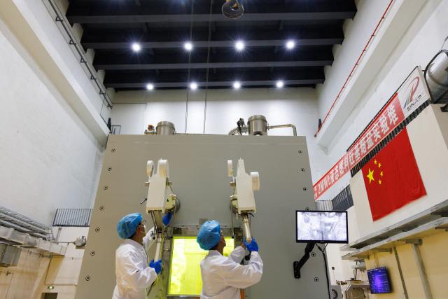 (251101) -- SHANGHAI, Nov. 1, 2025 (Xinhua) -- Researchers use mechanical arms to remove fuel salt samples at the Wuwei campus of the Chinese Academy of Sciences' Shanghai Institute of Applied Physics (SINAP) in Minqin County of Wuwei City, northwest China's Gansu Province, Oct. 24, 2025. China has successfully achieved the first-ever thorium to uranium nuclear fuel conversion in a Thorium Molten Salt Reactor (TMSR), and obtained valid experimental data following thorium fuel loading, confirming the technical feasibility of thorium utilization in a molten-salt reactor nuclear energy system, according to the Chinese Academy of Sciences' Shanghai Institute of Applied Physics (SINAP) on Saturday. 
   TO GO WITH "China achieves thorium-uranium nuclear fuel conversion in molten-salt reactor" (Xinhua/Jin Liwang)