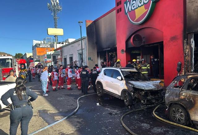 (251102) -- HERMOSILLO, Nov. 2, 2025 (Xinhua) -- Rescuers work at a fire-damaged chain department store in Hermosillo, Sonora state, northern Mexico, on Nov. 1, 2025. At least 22 people were killed after an explosion triggered a fire at a department store in Hermosillo, capital of the northern Mexican state of Sonora, local media reported Saturday.
   The explosion occurred in the afternoon at a chain department store in the city center, according to the reports. Witnesses said the fire quickly spread through the building and nearby vehicles, trapping several people inside. (El Sol de Hermosillo/Handout via Xinhua)