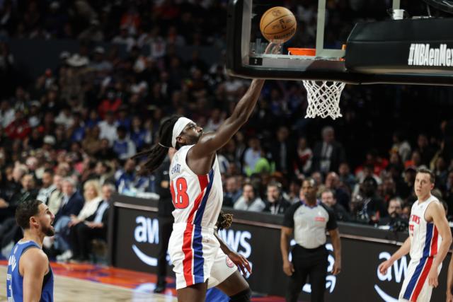 (251102) -- MEXICO CITY, Nov. 2, 2025 (Xinhua) -- Detroit Pistons' Isaiah Stewart goes for a lay-up during the 2025-2026 NBA regular season match between Detroit Pistons and Dallas Mavericks in Mexico City, capital of Mexico, on Nov. 1, 2025. (Photo by Francisco Canedo/Xinhua)