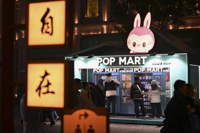 (251102) -- TAIYUAN, Nov. 2, 2025 (Xinhua) -- People shop at Zhonglou Street in Taiyuan, north China's Shanxi Province, Oct. 29, 2025. As both a commercial hub and cultural landmark of Taiyuan, Zhonglou Street carries a millennium of local history. However, rapid urban development once left it struggling with aging facilities, narrow spaces, and traffic congestion.
     In 2020, Taiyuan launched a renovation project for the area, and by September of 2021, the historic street renewed with a fresh look. The upgrade preserved the traditional street layout and architectural style while integrating modern elements and functions, attracting numerous locals and tourists daily.
    In 2022, Zhonglou Street was listed among the second batch of national nighttime cultural and tourism consumption clusters. In 2023, it was included in the second batch of national-level tourism and leisure blocks. During this year's National Day holiday, nearly 900,000 visits were made to the street, cementing its status as a true "city living room." (Xinhua/Yang Chenguang)
