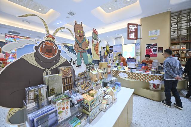 (251102) -- TAIYUAN, Nov. 2, 2025 (Xinhua) -- People shop at Zhonglou Street in Taiyuan, north China's Shanxi Province, Oct. 29, 2025. As both a commercial hub and cultural landmark of Taiyuan, Zhonglou Street carries a millennium of local history. However, rapid urban development once left it struggling with aging facilities, narrow spaces, and traffic congestion.
     In 2020, Taiyuan launched a renovation project for the area, and by September of 2021, the historic street renewed with a fresh look. The upgrade preserved the traditional street layout and architectural style while integrating modern elements and functions, attracting numerous locals and tourists daily.
    In 2022, Zhonglou Street was listed among the second batch of national nighttime cultural and tourism consumption clusters. In 2023, it was included in the second batch of national-level tourism and leisure blocks. During this year's National Day holiday, nearly 900,000 visits were made to the street, cementing its status as a true "city living room." (Xinhua/Yang Chenguang)