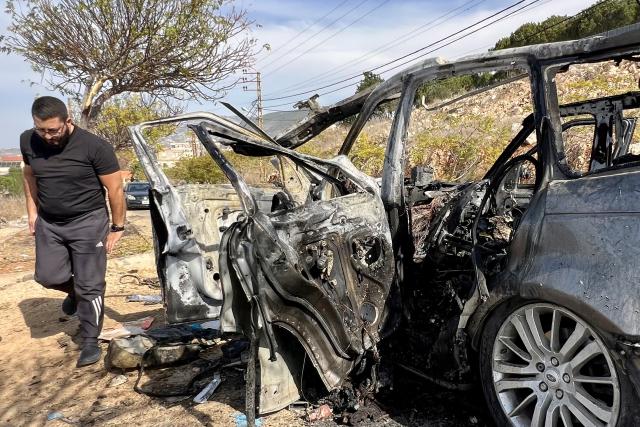 (251103) -- BEIRUT, Nov. 3, 2025 (Xinhua) -- A man walks beside the wreckage of a car bombed by an Israeli drone in Kfar Roummane, southern Lebanon, Nov. 2, 2025.
  Four people were killed and three others injured on Saturday night in an Israeli airstrike on the southern Lebanese village of Kfar Roummane, the country's Public Health Emergency Operations Center reported.
  According to the National News Agency (NNA), an Israeli drone carried out the airstrike at around 10:20 p.m. local time (2020 GMT) on Saturday, targeting a four-wheel-drive vehicle with a guided missile on the Doha-Kfar Roummane road, on the eastern outskirts of the village. (Photo by Ali Hashisho/Xinhua)