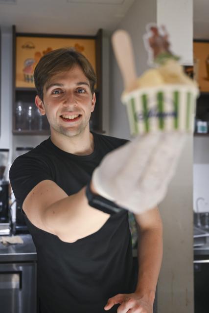 (251103) -- SHANGHAI, Nov. 3, 2025 (Xinhua) -- Alessandro Conti displays an ice cream at his gelato shop in Shanghai, east China, Sept. 30, 2025.
  At the Hengshan-Fuxing Roads (Hengfu) Historic Protection Zone in Shanghai's Xuhui District, there is a shop named Amuni Gelato, offering Italian-style ice cream. The owner of the gelato shop is Alessandro Conti.
  The connection between Conti and China began during his student years. He studied Chinese at the University of Palermo and later went to Chongqing in southwest China as an exchange student. With a bachelor's degree in simultaneous interpretation, he is fluent in Italian, English, and Chinese. 
  "I've lived in many cities in China, but Shanghai is my favorite," Conti said. "It's international and diverse, and offers everyone the opportunity to express themselves." It is Conti's preference for Shanghai that motivated him to settle down in Shanghai and start his own business. 
  As an Italian food vlogger and entrepreneur based in Shanghai, Conti believes that Shanghai's openness and inclusiveness are catalysts for young entrepreneurs. 
  "Setting up a company here is convenient. From registration to the business license offering, the efficiency is remarkable," said Conti. "I want to build up my family and my future here." (Xinhua/Chen Haoming)
