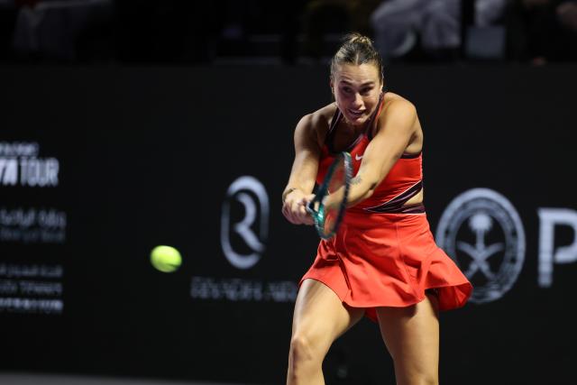 (251103) -- RIYADH, Nov. 3, 2025 (Xinhua) -- Aryna Sabalenka of Belarus returns a ball during the round robin match against Jasmine Paolini of Italy at WTA Finals tennis tournament in Riyadh, Saudi Arabia, on Nov. 2, 2025. (Xinhua/Luo Chen)