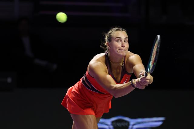 (251103) -- RIYADH, Nov. 3, 2025 (Xinhua) -- Aryna Sabalenka of Belarus returns a ball during the round robin match against Jasmine Paolini of Italy at WTA Finals tennis tournament in Riyadh, Saudi Arabia, on Nov. 2, 2025. (Xinhua/Luo Chen)