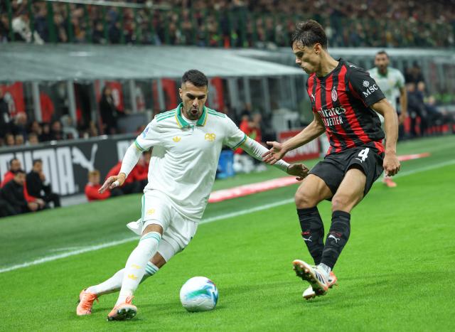 (251103) -- MILAN, Nov. 3, 2025 (Xinhua) -- AC Milan's Samuele Ricci (R) vies with Roma's Zeki Celik during a Serie A football match between AC Milan and Roma in Milan, Italy, on Nov. 2, 2025. (Xinhua/Li Jing)