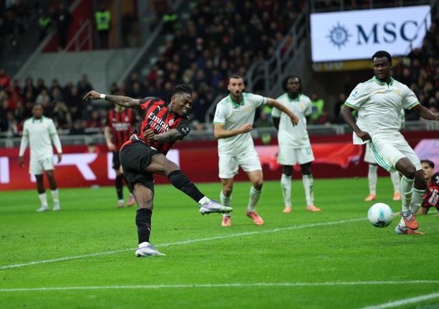 (251103) -- MILAN, Nov. 3, 2025 (Xinhua) -- AC Milan's Rafael Leao (front) competes during a Serie A football match between AC Milan and Roma in Milan, Italy, on Nov. 2, 2025. (Xinhua/Li Jing)