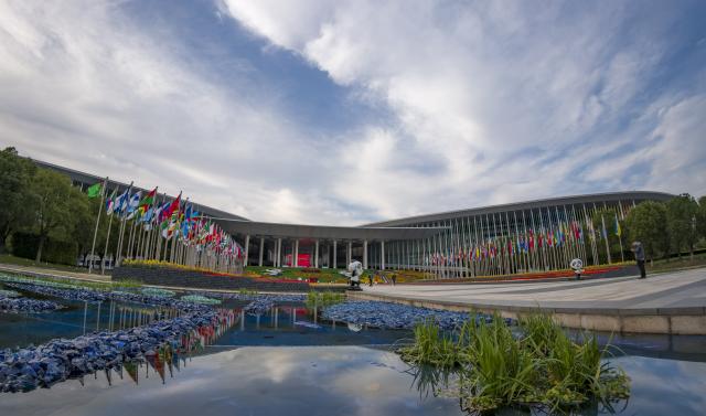 (251103) -- SHANGHAI, Nov. 3, 2025 (Xinhua) -- This photo taken on Nov. 3, 2025 shows the south square of the National Exhibition and Convention Center (Shanghai), the main venue for the eighth China International Import Expo (CIIE), in east China's Shanghai. The eighth CIIE will be held in Shanghai from Nov. 5 to 10. The event this year will feature 4,108 overseas exhibitors from 155 countries, regions and international organizations, with the total exhibition area exceeding 430,000 square meters, setting a new record in scale. (Xinhua/Fang Zhe)