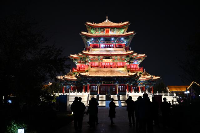 (251103) -- CANGZHOU, Nov. 3, 2025 (Xinhua) -- People visit the Nanchuan Tower along the Grand Canal in Yunhe District of Cangzhou, north China's Hebei Province, Oct. 29, 2025.
  The Grand Canal, which connects Beijing in northern China and the eastern Chinese city of Hangzhou, has a history of more than 2,500 years and is known as the world's longest artificial waterway. An embankment road has been built along the Cangzhou section of the canal, extending 308 kilometers and connecting over 300 villages across the city. The road links natural landscapes, historical and cultural sites, and human landscapes along its line. In addition, more than ten themed parks and relevant supporting facilities have been accordingly constructed along the line, forming a multi-functional space that integrates tourism, leisure, fitness, and recreation activities. The road has not only benefited the locals but also promoted regional connectivity and injected vitality into economic and social development. (Xinhua/Mu Yu)