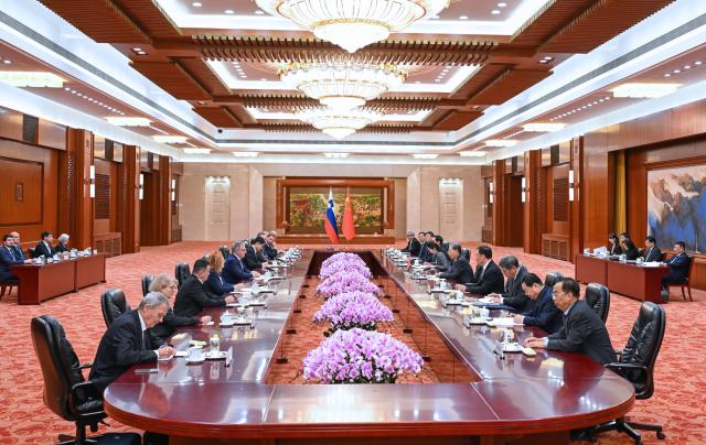 (251103) -- BEIJING, Nov. 3, 2025 (Xinhua) -- Zhao Leji, chairman of the National People's Congress (NPC) Standing Committee, meets with Marko Lotric, president of the National Council of Slovenia, in Beijing, capital of China, Nov. 3, 2025. (Xinhua/Rao Aimin)