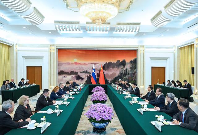 (251103) -- BEIJING, Nov. 3, 2025 (Xinhua) -- Wang Huning, chairman of the National Committee of the Chinese People's Political Consultative Conference (CPPCC), meets with Marko Lotric, president of the National Council of Slovenia, in Beijing, capital of China, Nov. 3, 2025. (Xinhua/Rao Aimin)