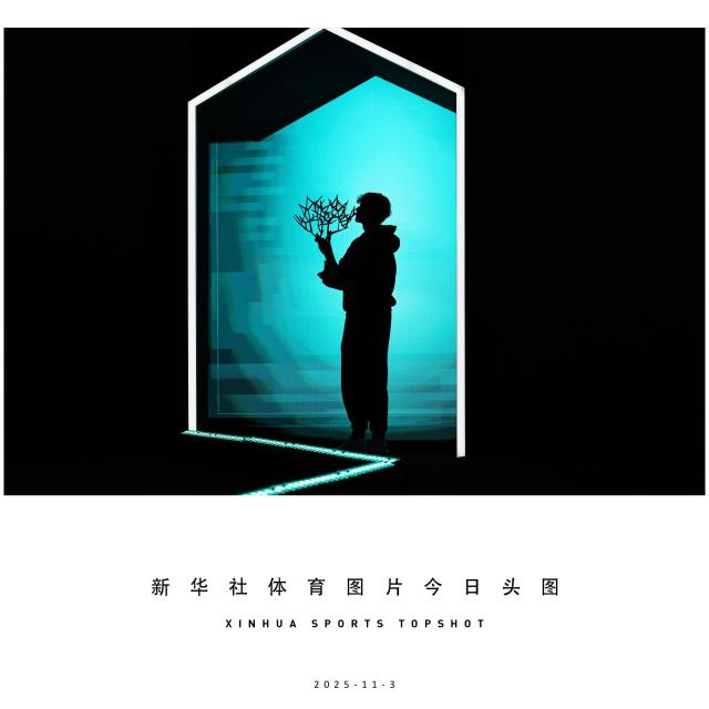 (251103) -- BEIJING, Nov. 3, 2025 (Xinhua) -- Jannik Sinner poses with the trophy after the final match between Jannik Sinner of Italy and Felix Auger-Aliassime of Canada at the Paris ATP Masters 1000 tennis tournament at Paris La Defense Arena in Paris, France, on Nov. 2, 2025. (Xinhua/Gao Jing)