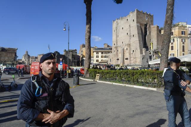(251103) -- ROME, Nov. 3, 2025 (Xinhua) -- Police and firefighters work on the site after a section of the Torre dei Conti, a medieval tower undergoing restoration in central Rome, Italy, Nov. 3, 2025. A section of the Torre dei Conti collapsed on Monday, injuring four construction workers and prompting an emergency rescue operation, local media reported. (Photo by Alberto Lingria/Xinhua)