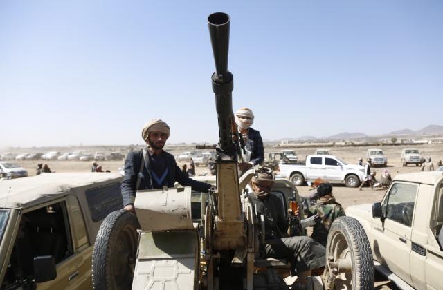 (251103) -- SANAA, Nov. 3, 2025 (Xinhua) -- Yemen's Houthi group fighters ride a vehicle with a heavy machine gun during a weaponized rally against Israel, at Arhab district north of Sanaa, Yemen, Nov. 3, 2025. The Houthi movement, which controls Yemen's capital Sanaa and much of the northwest, announced a general mobilization on Monday, calling on allied tribes to prepare for a potential Israeli air strike. (Photo by Mohammd Mohammd/Xinhua)