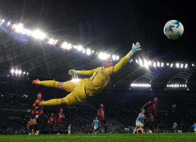 (251104) -- ROME, Nov. 4, 2025 (Xinhua) -- Cagliari's goalkeeper Elia Caprile failed to save the goal from Lazio's Gustav Isaksen during a Serie A football match between Lazio and Cagliari in Rome, Italy, on Nov.3, 2025. (Photo by Alberto Lingria/Xinhua)