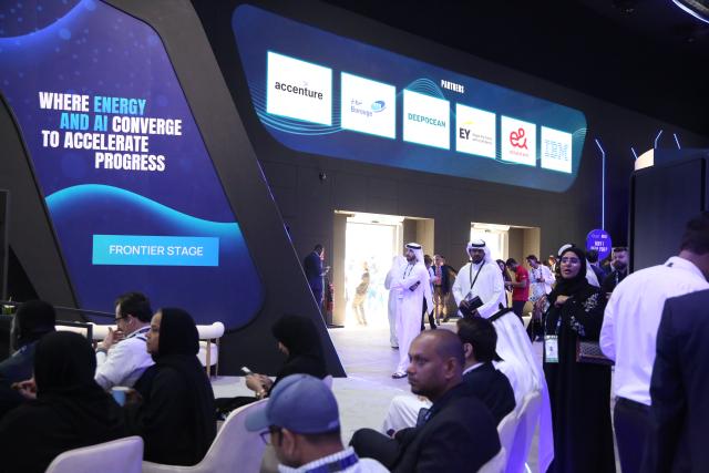 (251104) -- ABU DHABI, Nov. 4, 2025 (Xinhua) -- This photo taken on Nov. 3, 2025 shows an exhibition area of the 41st Abu Dhabi International Petroleum Exhibition and Conference (ADIPEC) in Abu Dhabi, the United Arab Emirates. The 41st ADIPEC, one of the world's largest energy events, opened on Monday at the Abu Dhabi National Exhibition Center, drawing more than 205,000 participants from around the world to discuss the future of energy and sustainable development. (Xinhua/Wen Xinnian)