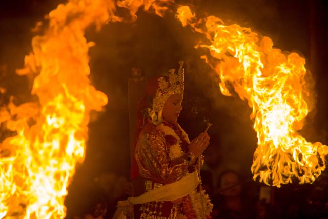 (251104) -- LALITPUR, Nov. 4, 2025 (Xinhua) -- A boy in traditional attire is pictured during the Kartik Naach festival at Patan Durbar Square in Lalitpur, Nepal, Nov. 4, 2025. (Photo by Sulav Shrestha/Xinhua)