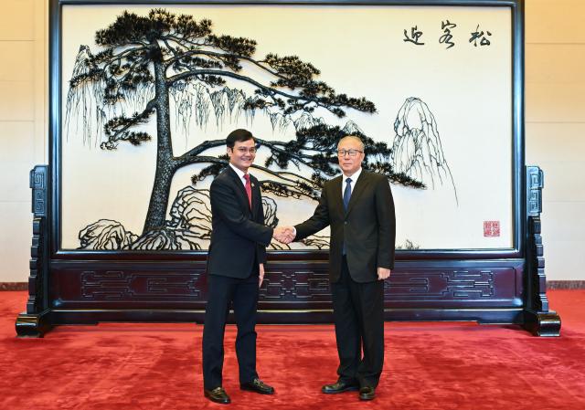 (251104) -- BEIJING, Nov. 4, 2025 (Xinhua) -- Li Hongzhong, a member of the Political Bureau of the Communist Party of China (CPC) Central Committee and vice chairman of the National People's Congress Standing Committee, meets with Bui Quang Huy, vice president of the Central Committee of the Vietnam Fatherland Front and first secretary of the Central Committee of the Ho Chi Minh Communist Youth Union, in Beijing, capital of China, Nov. 4, 2025. (Xinhua/Li Xin)