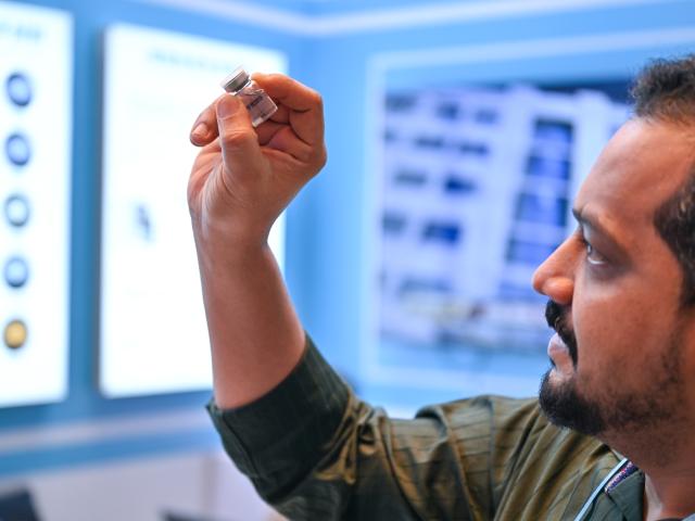 (251104) -- GUANGZHOU, Nov. 4, 2025 (Xinhua) -- A buyer looks at a 3D-printed sample of biological product during the 138th edition of the China Import and Export Fair in Guangzhou, south China's Guangdong Province, Nov. 3, 2025. The 138th Canton Fair, known officially as the China Import and Export Fair, came to a close on Tuesday in Guangzhou, the capital city of south China's Guangdong Province, having seen a record number of overseas buyers attend. (Xinhua/Xiao Ennan)