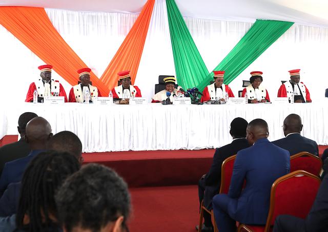 (251104) -- ABIDJAN, Nov. 4, 2025 (Xinhua) -- President of Cote d'Ivoire's Constitutional Council Chantal Camara (C) declares Alassane Ouattara as the winner of the presidential election held on Oct. 25 during a ceremony in Abidjan, Cote d'Ivoire, on Nov. 4, 2025. (Photo by Yvan Sonh/Xinhua)