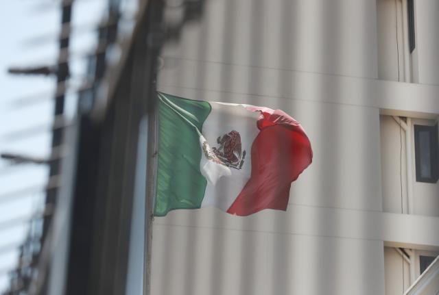 (251104) -- LIMA, Nov. 4, 2025 (Xinhua) -- Photo taken on Nov. 4, 2025, shows a Mexican flag inside the Mexican Embassy in Lima, Peru. The government of Peru has decided to break diplomatic relations with Mexico, Peruvian Foreign Minister Hugo de Zela told a press conference on Monday. (Photo by Mariana Bazo/Xinhua)