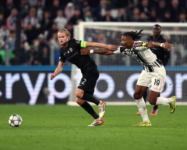 (251105) -- TURIN, Nov. 5, 2025 (Xinhua) -- Juventus' Khephren Thuram (R) vies with Sporting's Morten Hjulmand during the UEFA Champions League football match between Juventus and Sporting in Turin, Italy, Nov. 4, 2025. (Xinhua)