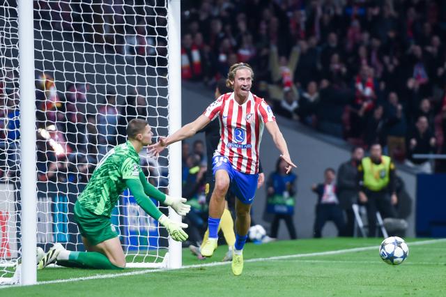 (251105) -- MADRID, Nov. 5, 2025 (Xinhua) -- Marcos Llorente (R) of Atletico de Madrid celebrates a goal during the UEFA Champions League football match between Atletico de Madrid and Union Saint-Gilloise in Madrid, Spain, on Nov. 4, 2025. (Photo by Gustavo Valiente/Xinhua)