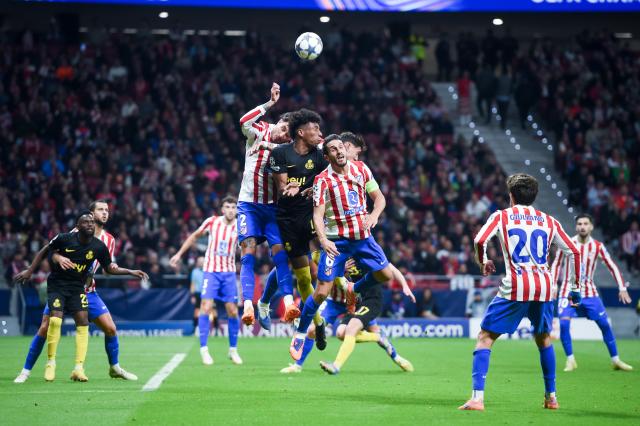 (251105) -- MADRID, Nov. 5, 2025 (Xinhua) -- Jose Maria Gimenez (L) and Koke (R) of Atletico de Madrid vie with Kevin Rodriguez of Union Saint-Gilloise during the UEFA Champions League football match between Atletico de Madrid and Union Saint-Gilloise in Madrid, Spain, on Nov. 4, 2025. (Photo by Gustavo Valiente/Xinhua)