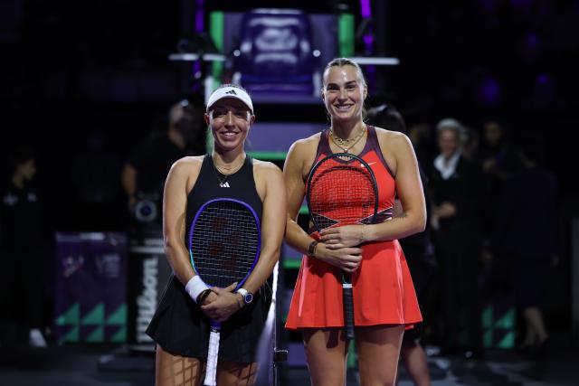 (251105) -- RIYADH, Nov. 5, 2025 (Xinhua) -- Aryna Sabalenka (R) of Belarus and Jessica Pegula of the United States pose for photos before their round robin match at WTA Finals tennis tournament in Riyadh, Saudi Arabia, on Nov. 4, 2025. (Xinhua/Luo Chen)