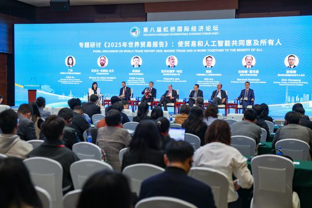 (251106) -- SHANGHAI, Nov. 6, 2025 (Xinhua) -- A seminar on World Trade Report 2025 and the launching ceremony of its Chinese edition is held during the 8th Hongqiao International Economic Forum at the National Exhibition and Convention Center (Shanghai) in Shanghai, east China, Nov. 6, 2025. (Xinhua/Wang Zecong)