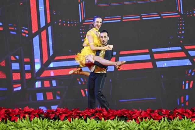 (251106) -- SHANGHAI, Nov. 6, 2025 (Xinhua) -- Actors perform at the China International Import Expo (CIIE) Culture Night event held on the sidelines of the eighth CIIE at the National Exhibition and Convention Center (Shanghai) in east China's Shanghai, Nov. 6, 2025. (Xinhua/Chen Haoming)