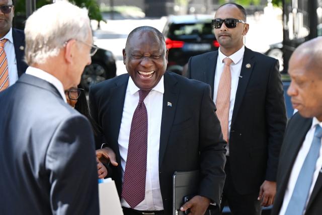 (251106) -- CAPE TOWN, Nov. 6, 2025 (Xinhua) -- South African President Cyril Ramaphosa (3rd R) arrives at parliament for a question-and-answer session in the National Assembly in Cape Town, South Africa, Nov. 6, 2025. Ramaphosa said on Thursday that the upcoming Group of 20 (G20) Leaders' Summit is expected to take concrete steps to reform the global financial system while addressing the deepening divide of global wealth and income inequality. (Photo by Xabiso Mkhabela/Xinhua)