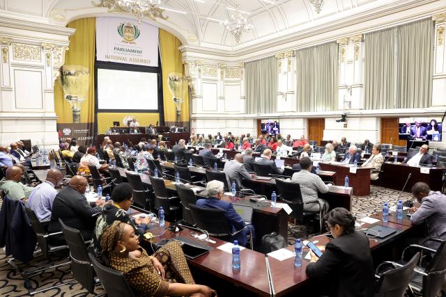 (251106) -- CAPE TOWN, Nov. 6, 2025 (Xinhua) -- South African President Cyril Ramaphosa (at the podium) speaks during a question-and-answer session in the National Assembly in Cape Town, South Africa, Nov. 6, 2025. Ramaphosa said on Thursday that the upcoming Group of 20 (G20) Leaders' Summit is expected to take concrete steps to reform the global financial system while addressing the deepening divide of global wealth and income inequality. (Photo by Xabiso Mkhabela/Xinhua)
