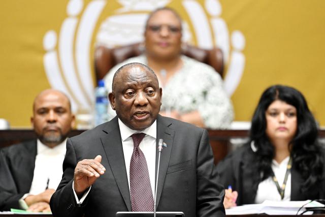 (251106) -- CAPE TOWN, Nov. 6, 2025 (Xinhua) -- South African President Cyril Ramaphosa speaks during a question-and-answer session in the National Assembly in Cape Town, South Africa, Nov. 6, 2025. Ramaphosa said on Thursday that the upcoming Group of 20 (G20) Leaders' Summit is expected to take concrete steps to reform the global financial system while addressing the deepening divide of global wealth and income inequality. (Photo by Xabiso Mkhabela/Xinhua)