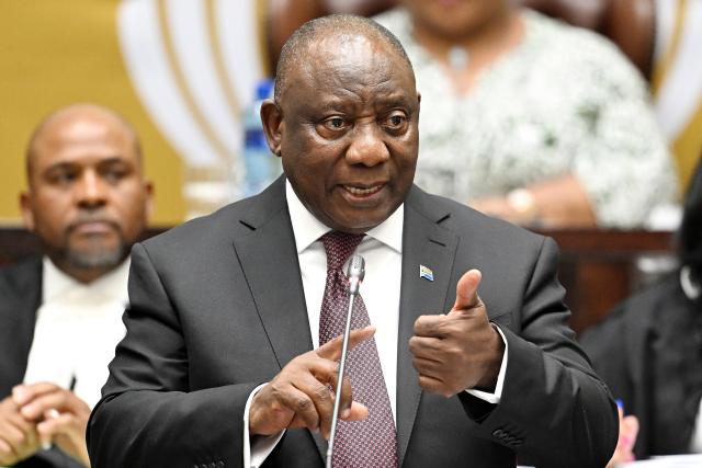 (251106) -- CAPE TOWN, Nov. 6, 2025 (Xinhua) -- South African President Cyril Ramaphosa speaks during a question-and-answer session in the National Assembly in Cape Town, South Africa, Nov. 6, 2025. Ramaphosa said on Thursday that the upcoming Group of 20 (G20) Leaders' Summit is expected to take concrete steps to reform the global financial system while addressing the deepening divide of global wealth and income inequality. (Photo by Xabiso Mkhabela/Xinhua)