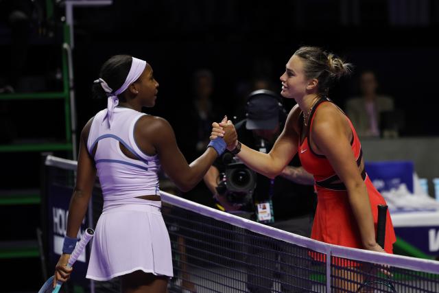 (251107) -- RIYADH, Nov. 7, 2025 (Xinhua) -- Aryna Sabalenka (R) of Belarus and Coco Gauff of the United States shake hands after their round robin match at WTA Finals tennis tournament in Riyadh, Saudi Arabia, Nov. 6, 2025. (Xinhua/Luo Chen)
