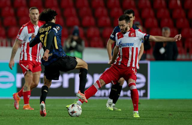 (251107) -- BELGRADE, Nov. 7, 2025 (Xinhua) -- Crvena Zvezda's Mirko Ivanic (front R) vies with LOSC Lille's Ayyoub Bouaddi (front L) during the UEFA Europa League football match between Crvena Zvezda and LOSC Lille in Belgrade, Serbia, on Nov. 6, 2025. (Photo by Predrag Milosavljevic/Xinhua)