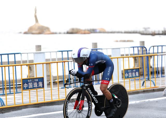 (251107) -- ZHUHAI, Nov. 7, 2025 (Xinhua) -- Zhao Wenhui of Hunan competes during the women's individual time trial of cycling road at China's 15th National Games in Zhuhai, south China's Guangdong Province, Nov. 7, 2025. (Xinhua/Mao siqian)
