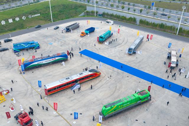 (251107) -- ZHUZHOU, Nov. 7, 2025 (Xinhua) -- An aerial drone photo taken on Nov. 7, 2025 shows the outdoor exhibition area of the 2025 China International Rail Transit & Equipment Manufacturing Industry Exposition in Zhuzhou, central China's Hunan Province. Boasting an exhibition area of about 40,000 square meters, the expo kicked off here on Friday, covering a wide range of fields such as rail transit and equipment manufacturing, key parts and raw materials, high-tech demonstration, intelligent systems, operation and maintaining, and infrastructure design and consultation. Magnetic levitation and other cutting-edge technologies are highlighted at this event. (Xinhua/Chen Sihan)