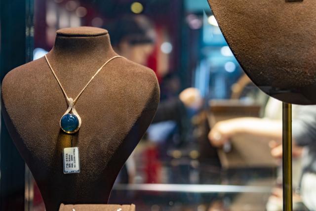 (251107) -- SHANGHAI, Nov. 7, 2025 (Xinhua) -- This photo shows a piece of jewelry from the Dominican Republic at the Consumer Goods exhibition area of the eighth China International Import Expo (CIIE) in east China's Shanghai, Nov. 7, 2025. The eighth CIIE opened here on Wednesday. Enterprises from a total of 123 Belt and Road partner countries participated in this year's CIIE, increasing by 23.1 percent year on year. (Xinhua/Ding He)