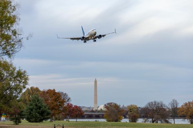 (251107) -- ARLINGTON, Nov. 7, 2025 (Xinhua) -- An American Airlines aircraft makes its final approach to Ronald Reagan Washington National Airport in Arlington, Virginia, the United States, Nov. 7, 2025. Nearly 1,000 U.S. flights were canceled on Friday as a reduction in air traffic took effect amid an air traffic controller staffing shortage during the longest government shutdown in U.S. history. (Xinhua/Hu Yousong)