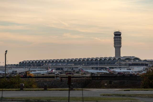 (251107) -- ARLINGTON, Nov. 7, 2025 (Xinhua) -- Aircrafts move along the tarmac at Ronald Reagan Washington National Airport in Arlington, Virginia, the United States, Nov. 7, 2025. Nearly 1,000 U.S. flights were canceled on Friday as a reduction in air traffic took effect amid an air traffic controller staffing shortage during the longest government shutdown in U.S. history. (Xinhua/Hu Yousong)