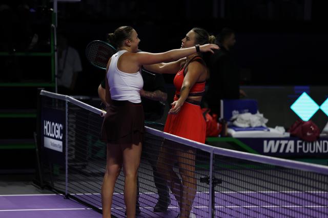(251108) -- RIYADH, Nov. 8, 2025 (Xinhua) -- Aryna Sabalenka (R) of Belarus and Amanda Anisimova of the United States hug after the semifinal at WTA Finals tennis tournament in Riyadh, Saudi Arabia, Nov. 7, 2025. (Xinhua/Luo Chen)