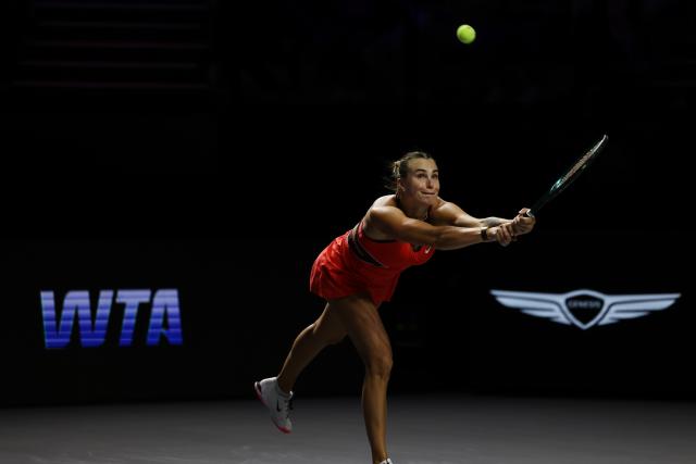 (251108) -- RIYADH, Nov. 8, 2025 (Xinhua) -- Aryna Sabalenka of Belarus returns a ball during the semifinal against Amanda Anisimova of the United States at WTA Finals tennis tournament in Riyadh, Saudi Arabia, Nov. 7, 2025. (Xinhua/Luo Chen)