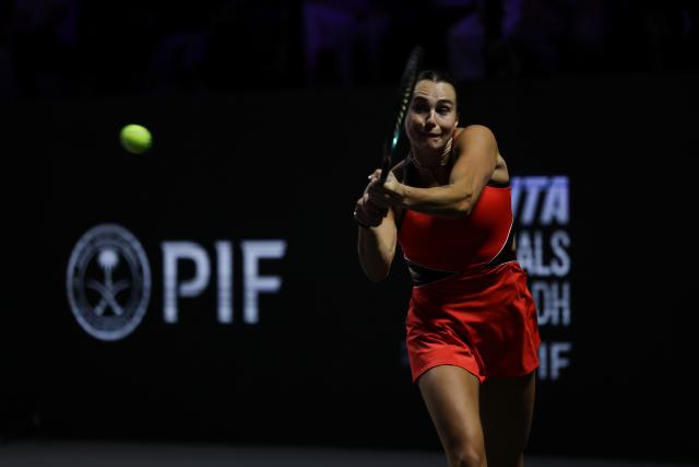 (251108) -- RIYADH, Nov. 8, 2025 (Xinhua) -- Aryna Sabalenka of Belarus returns a ball during the semifinal against Amanda Anisimova of the United States at WTA Finals tennis tournament in Riyadh, Saudi Arabia, Nov. 7, 2025. (Xinhua/Luo Chen)